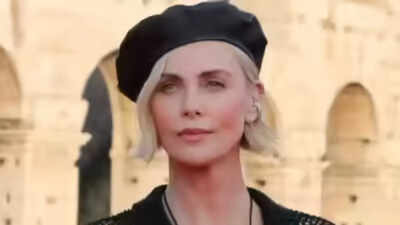 ‘Apex’ star Charlize Theron recalls her mother shooting her father to keep them safe |