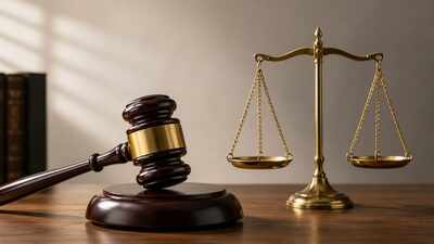 Calcutta High Court holds husband’s pressure on wife to bring share of ancestral property can constitute dowry demand; reduces life sentence to 10 years, acquits in-laws